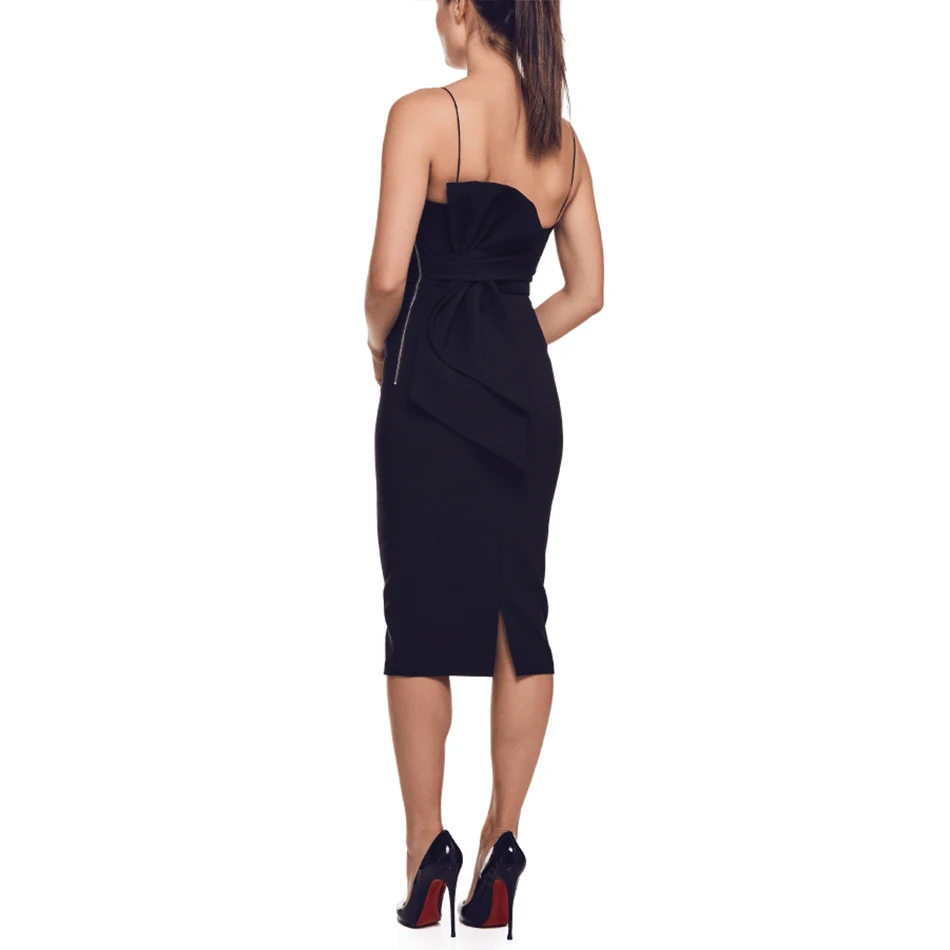 Женское вечернее облегающее платье бежевое на тонких бретельках с бантом и