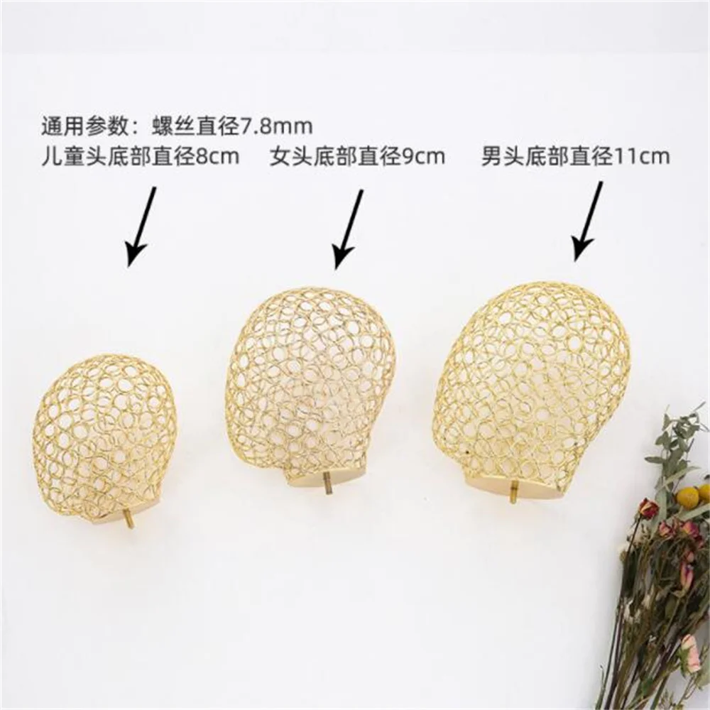 Женский манекен с вырезами декорированная тканью золотистая/Серебристая