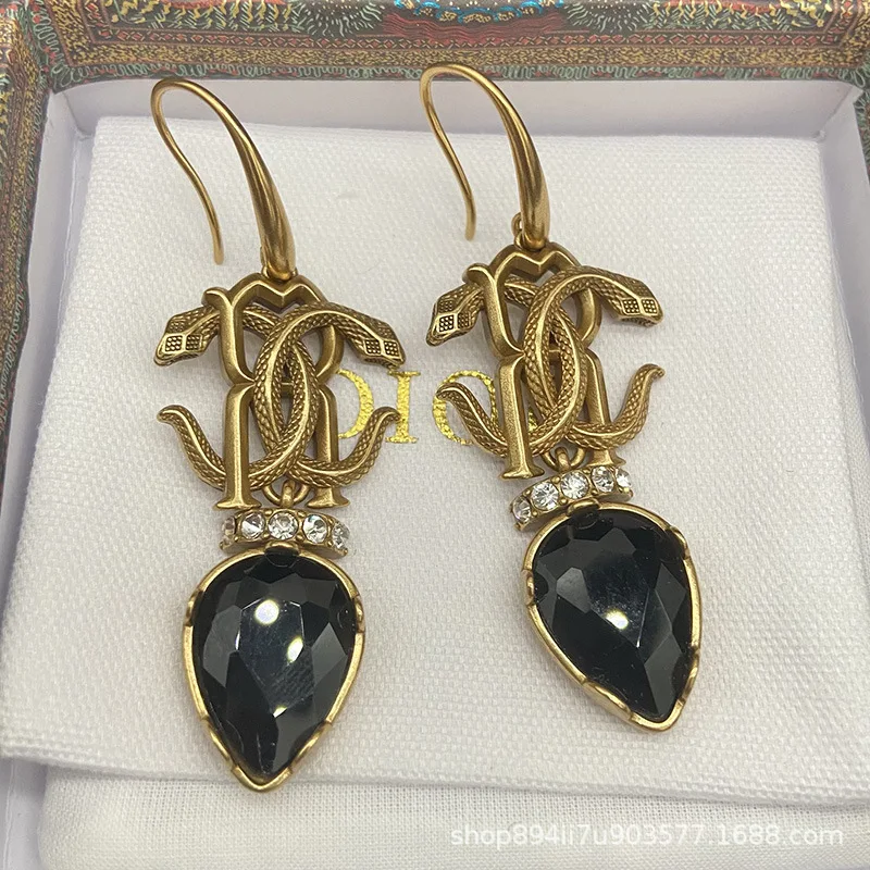 

Double snake bronze gold-plated distressed crystal diamond earrings