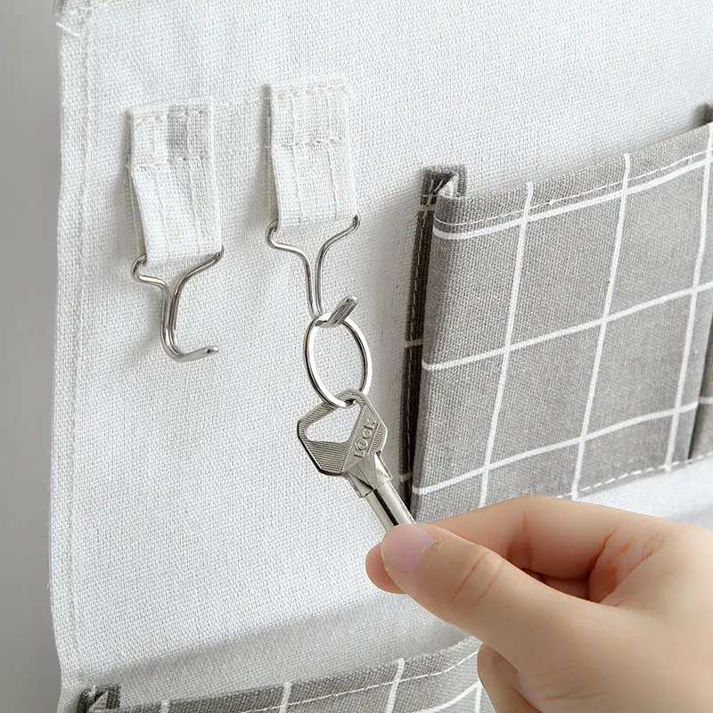 

After receiving the hanging bag door, the storage bag hangs on the wall hanging student dormitory bedroom hanging pocket cloth