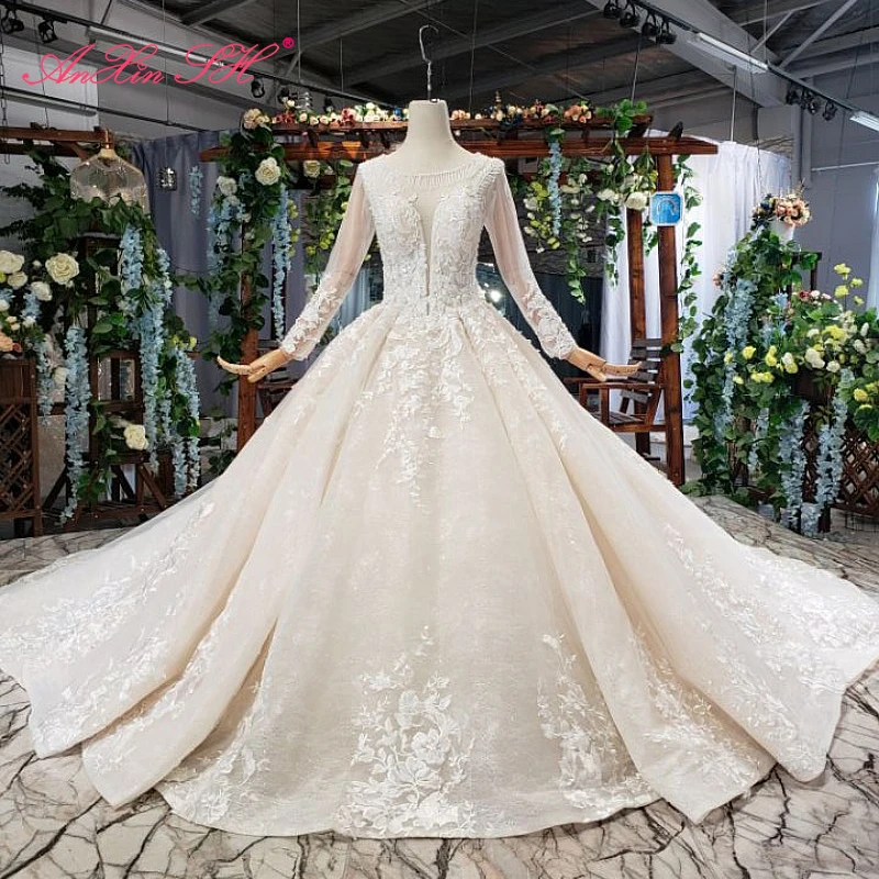 

AnXin SH Luxury princess flower champagne lace o neck beading crystal white long sleeve sparkly wedding dress 100% real photo