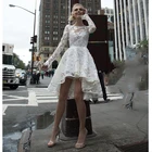 Платье свадебное короткое с длинным рукавом и кружевной аппликацией