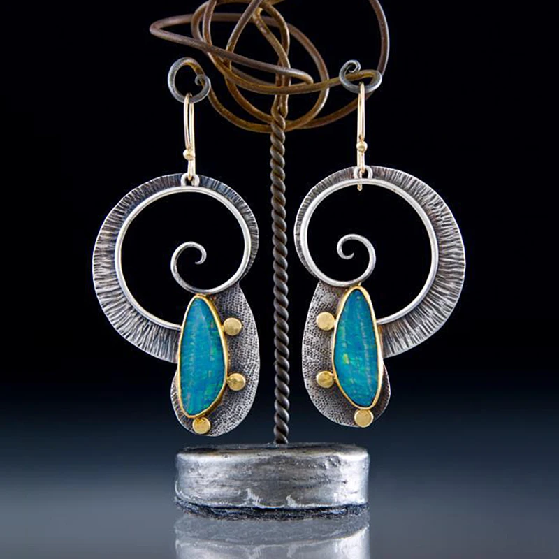 Серьги подвески в горошек с большим диском и спиральными улитками бижутерия