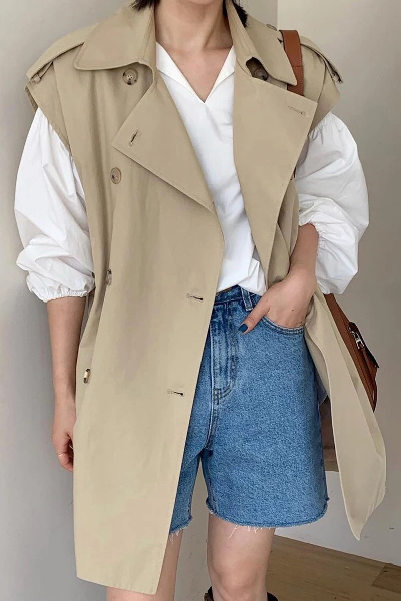 

Korean chic retro British style lapel double-breasted loose solid color mid-length sleeveless windbreaker vest jacket women