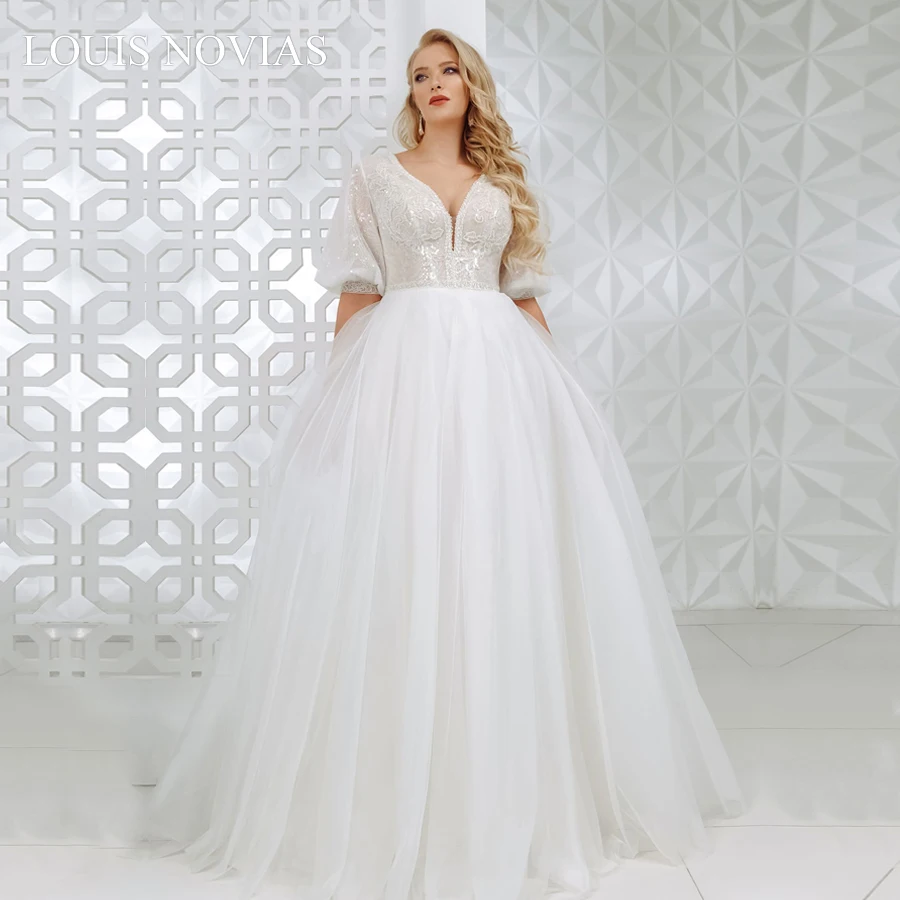 Свадебное платье принцессы с блестками а образным вырезом и аппликацией из