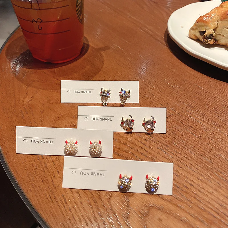 

LOVOACC Multiple Cute Rhinestones Cattle Earrings for Women Red Enamel Pearls Animal Bull Stud Earrings 2021 New Year Jewelry