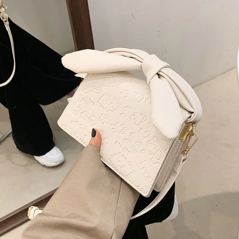 

Bow Baguette Bag 2021 Trend Luxury Purses and Handbags with Short Handles Cartoons Embossed Fashion Women's Shoulder Bag Leather