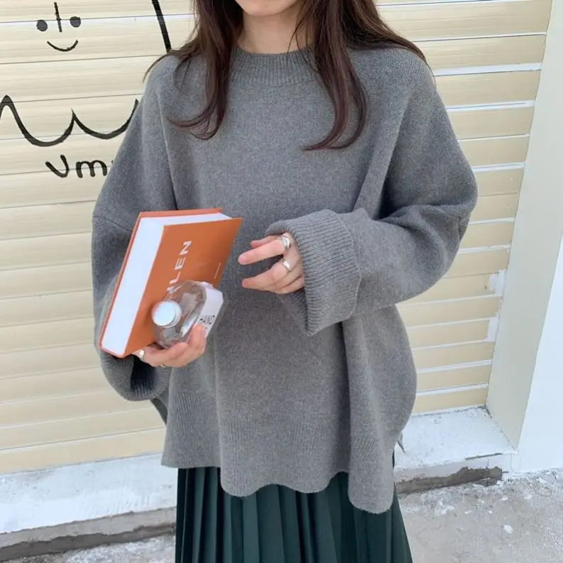 

Autumn And Winter New Korean Solid Split Loose Sweater Long Sleeves For Female Students