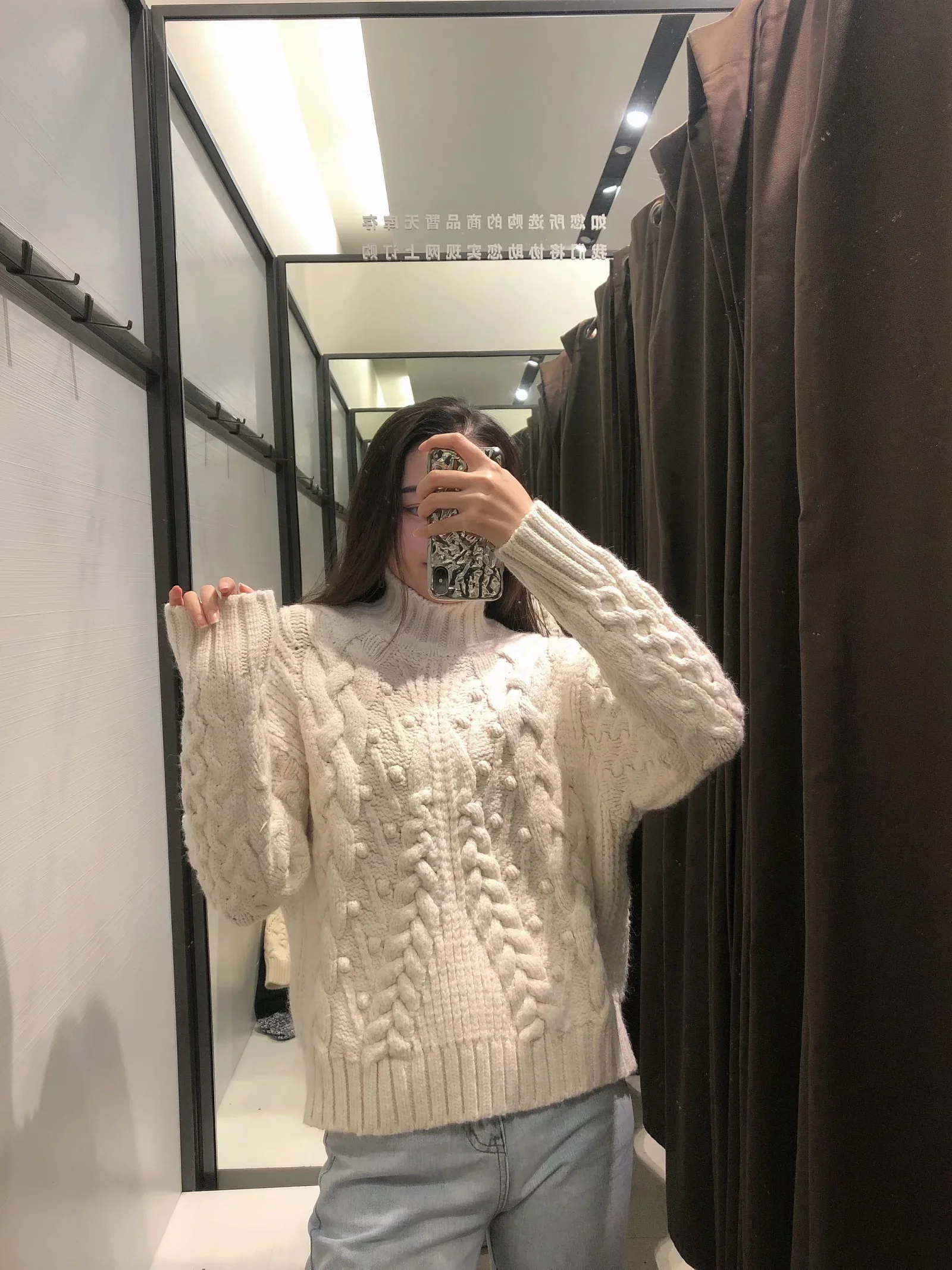 

Twisted rope knit sweater top