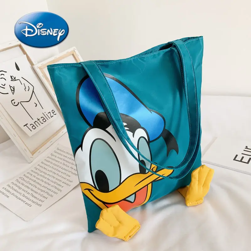 

Disney Donald Duck Cartoon Woman Shoulder Bag Multifunctional Large Capacity Handbag Shopping Tote Bag luxury designer handbag