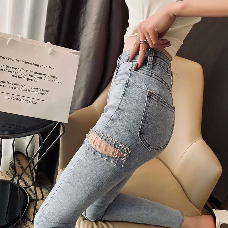 

SHZQ New Fashion Spring Summer Fashion Streetwear Thigh Cut Diamonds Tassel Skinny Jeans Women Denim Pants Kz566