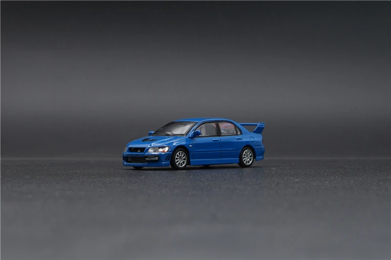 

Синяя модель автомобиля с литым давлением BM Creations 1:64 Mitsubishi Lancer Evolution VII RHD