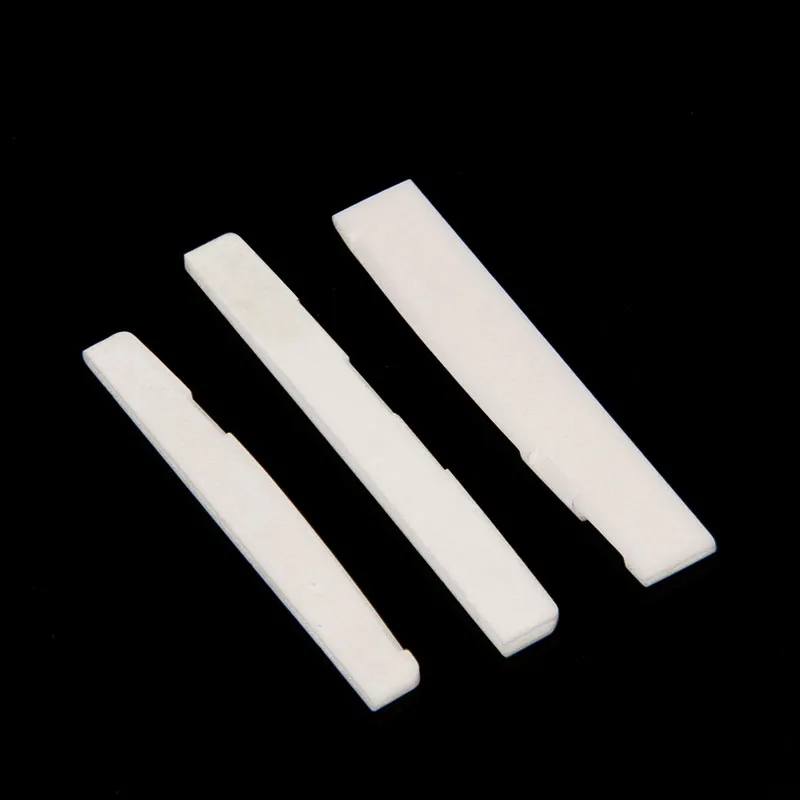 Седло с костяной перемычкой для фольклорной акустической гитары белые Сменные