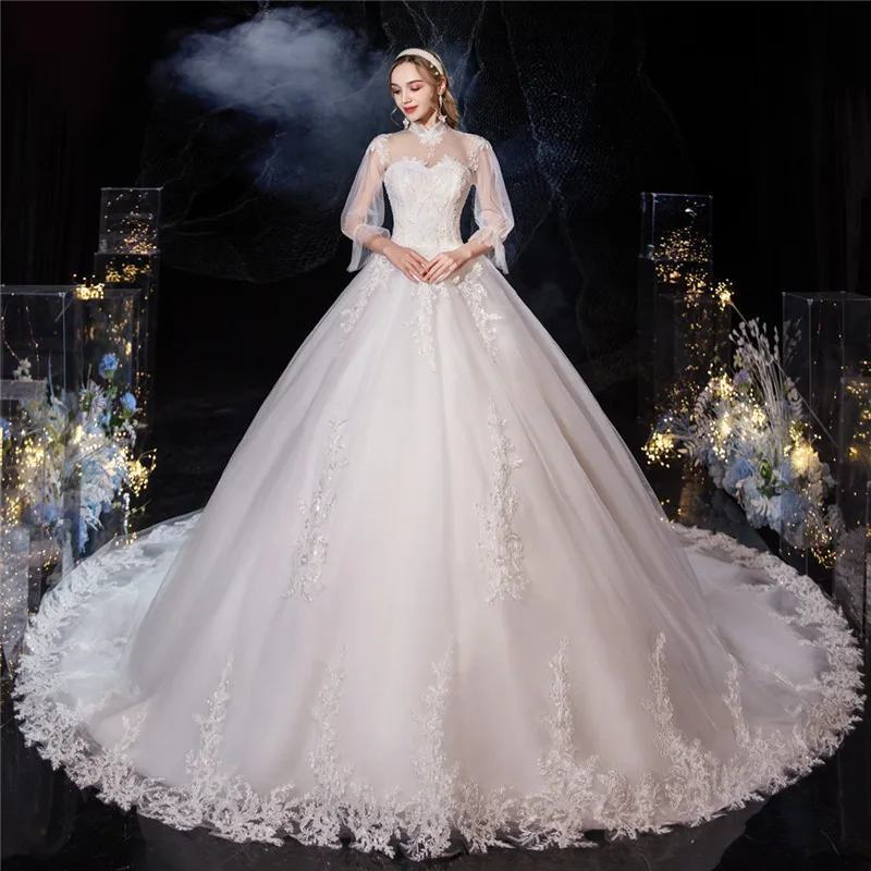 Роскошное кружевное свадебное платье с вышивкой винтажное высоким воротом и
