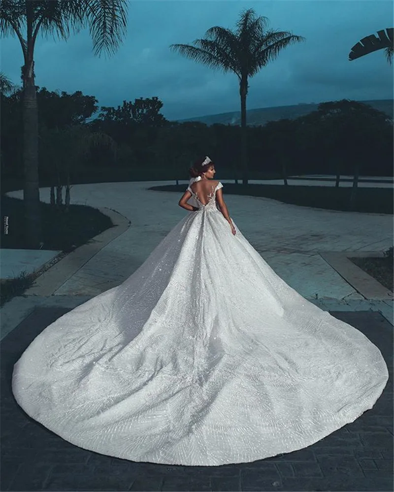 Luxury Deep V-neck Ball Gown Beading Lace Wedding Dress 2019 Backless Tulle Wedding Gowns Cap Sleeves With Pearls Robe De Mariee