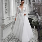 Белое свадебное платье в стиле бохо, с V-образным вырезом и блестками