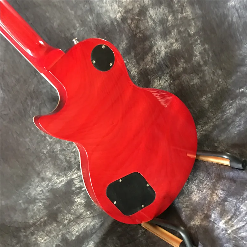 

High quality electric guitar, maple flame, top quality, in stock.