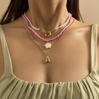 simple necklace for women with geometric letter star tassel necklace retro imitation pearl ot buckle round bead necklace