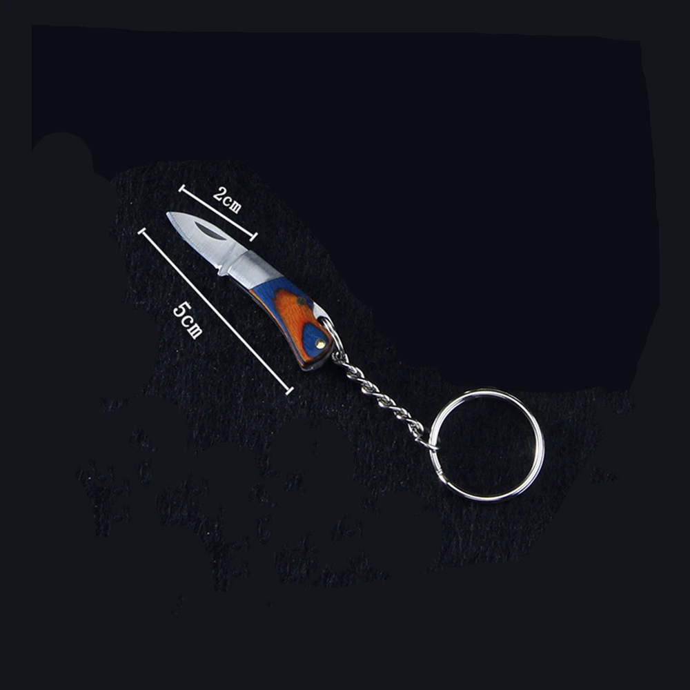 Koop Pocket Mini Blade Vouw Sleutelhanger Draagbare Outdoor Kamp Mes Sleutelhanger Dunschiller Overleven Kit Gadget Pakket Box Opener Multi Gereedschap