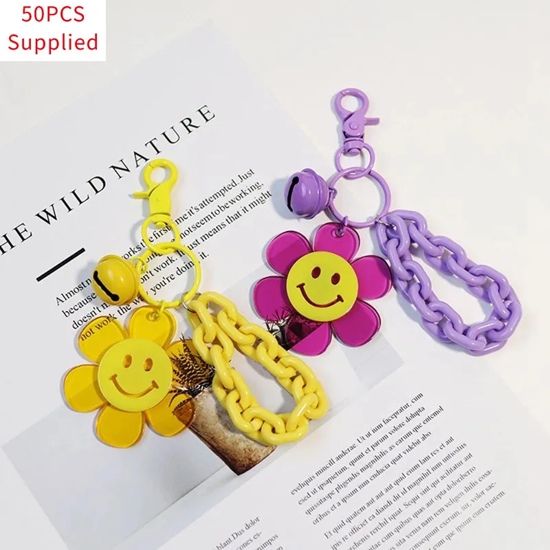 

50pcs Alloy Fashion Car Bag Accessories Fashion Keychain Ladies Keychain Silicone Cartoon Smiley Sunflower Keychain Bell Pendant