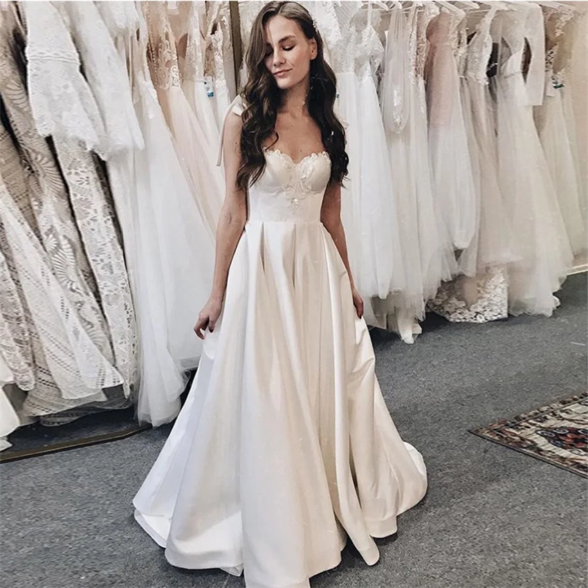 

2020 New Delicate Beading Wedding Dress Bow Spaghetti Straps White Ivory Bridal Gowns Sweep Train Lace Up Back Vestido De Novia