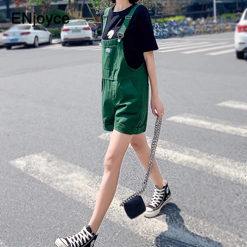 Женский джинсовый комбинезон повседневный зеленый на бретельках с большими