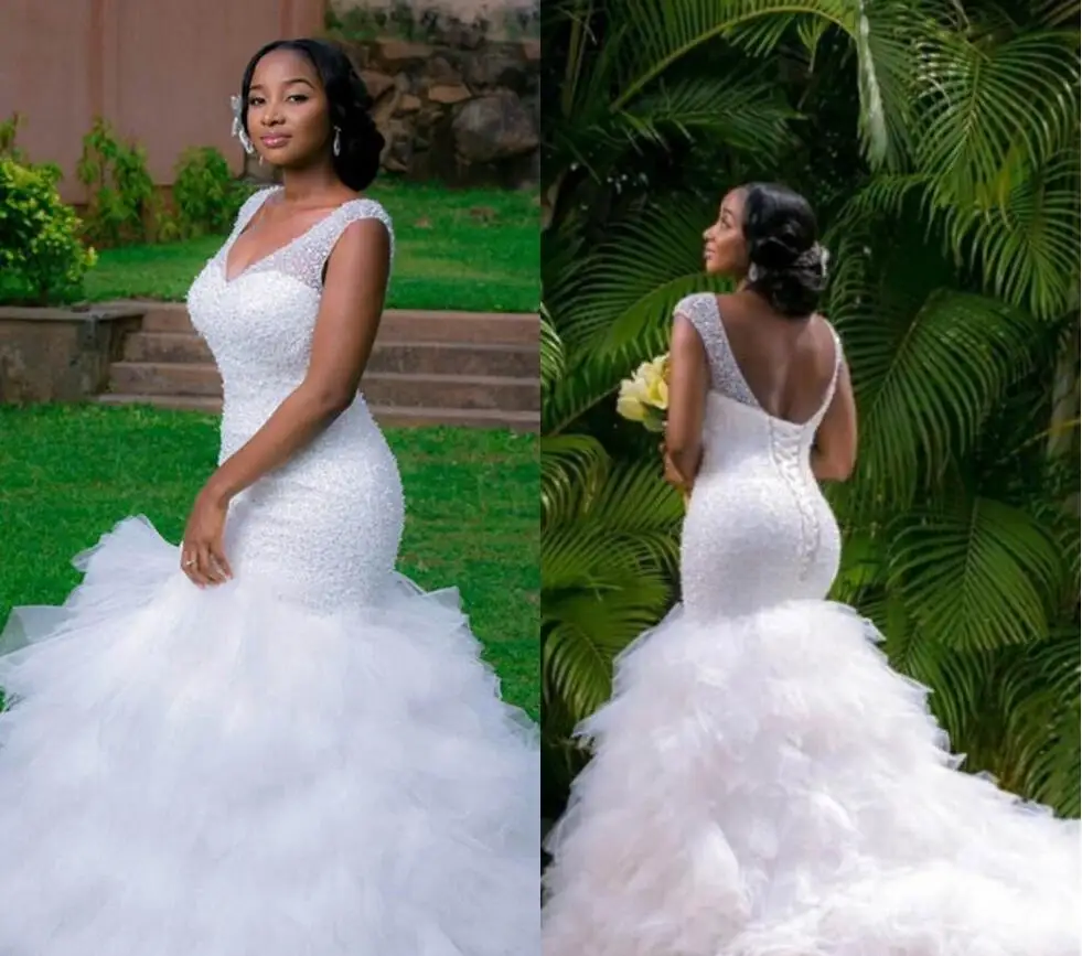 

Customize Latest African Bridal Sexy V Neck Sleeveless Sequins Bust Ruffles Skirt Long Train Mermaid wedding dress
