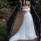 Платье свадебное с открытыми плечами, пуговицами на спине