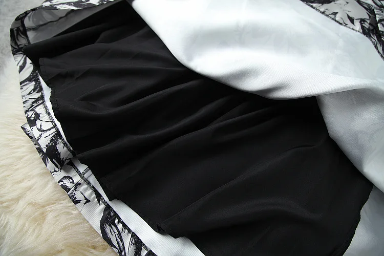 

European and American women's wear 2020 winter new style Long-sleeved V-neck knit sweater Pleated printed skirt Fashion suits