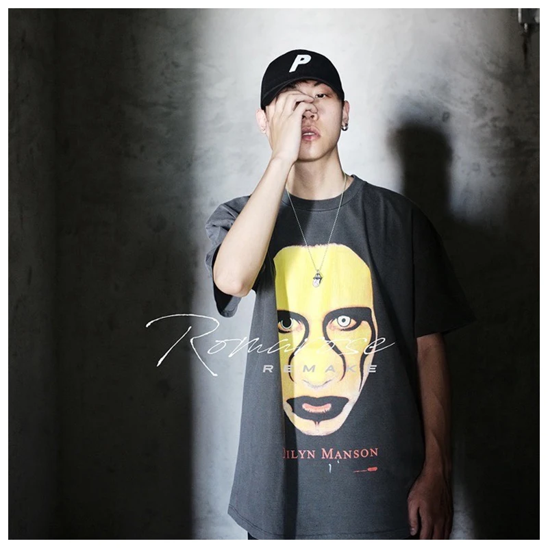 

Уличная трендовая свободная Мужская футболка Marilyn Manson, винтажная промытая черная маска с принтом трещин, Женская хлопковая Футболка оверса...