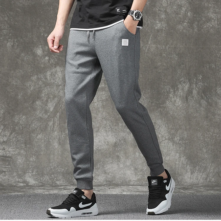 

Men Cotton Fitness Pants New Sweatpants Men's Streetwear Pants Fashion Full Length Drawstring Trousers For Men Casual Pants 4XL