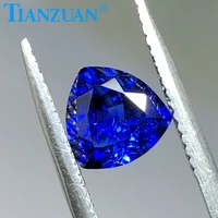 blue color trillion shape natural cut artificial sapphire corundum stone with cracks and inclusions loose stone