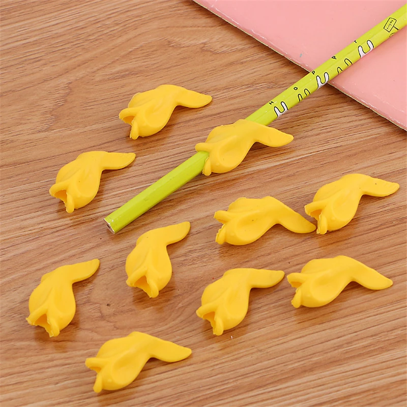 

10 pcs/Lot Dolphin Fish Writing Posture Correction Device To Hold A Pen Correction Silicone Stationery Child Student