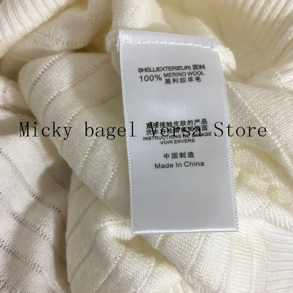 

2021 luxury design letter button fashion women's long sleeve wool knitted cardigan temperament versatile V-neck elegant coat