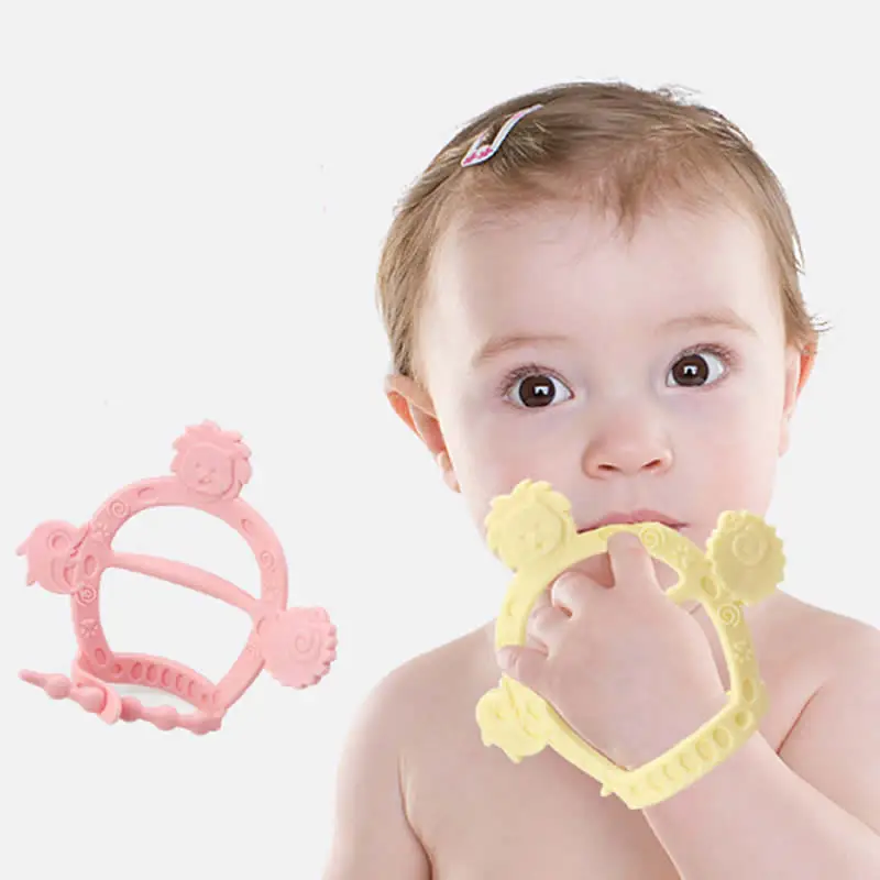 

Baby silicone baby teeth grinding against bite gloves molar stick to eat a bite of a grinding machine rubber ring hand artifact
