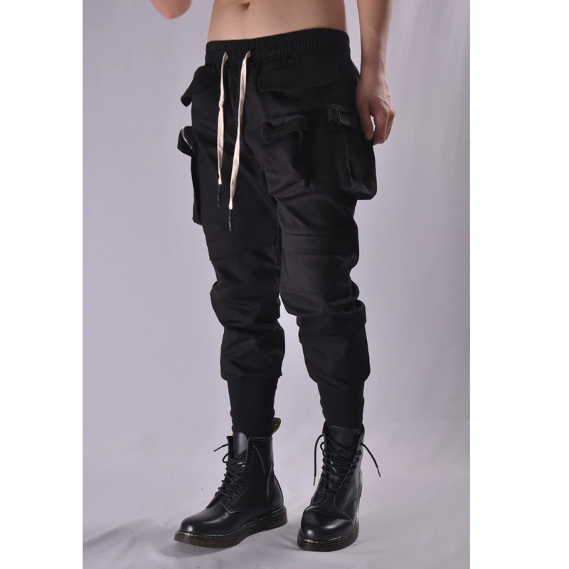 

Korean version of simple multi-pocket overalls men's self-cultivation hair stylist feet harem pants trend