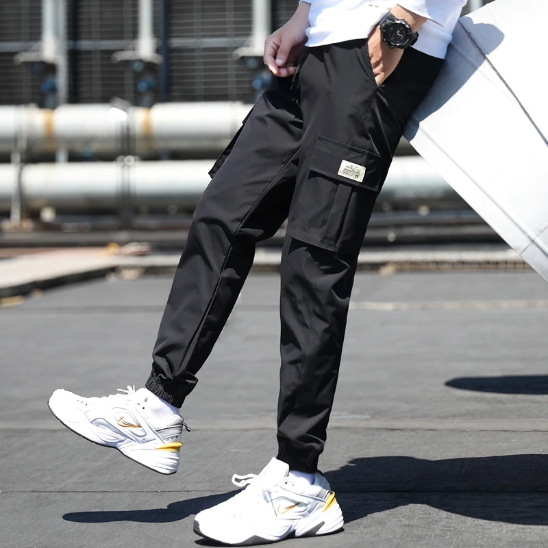 

2021 New Casual Pockets TrackPants Male Fashion Harem Joggers Men Long Trousers Cargo HighQuality Pant Streetwear