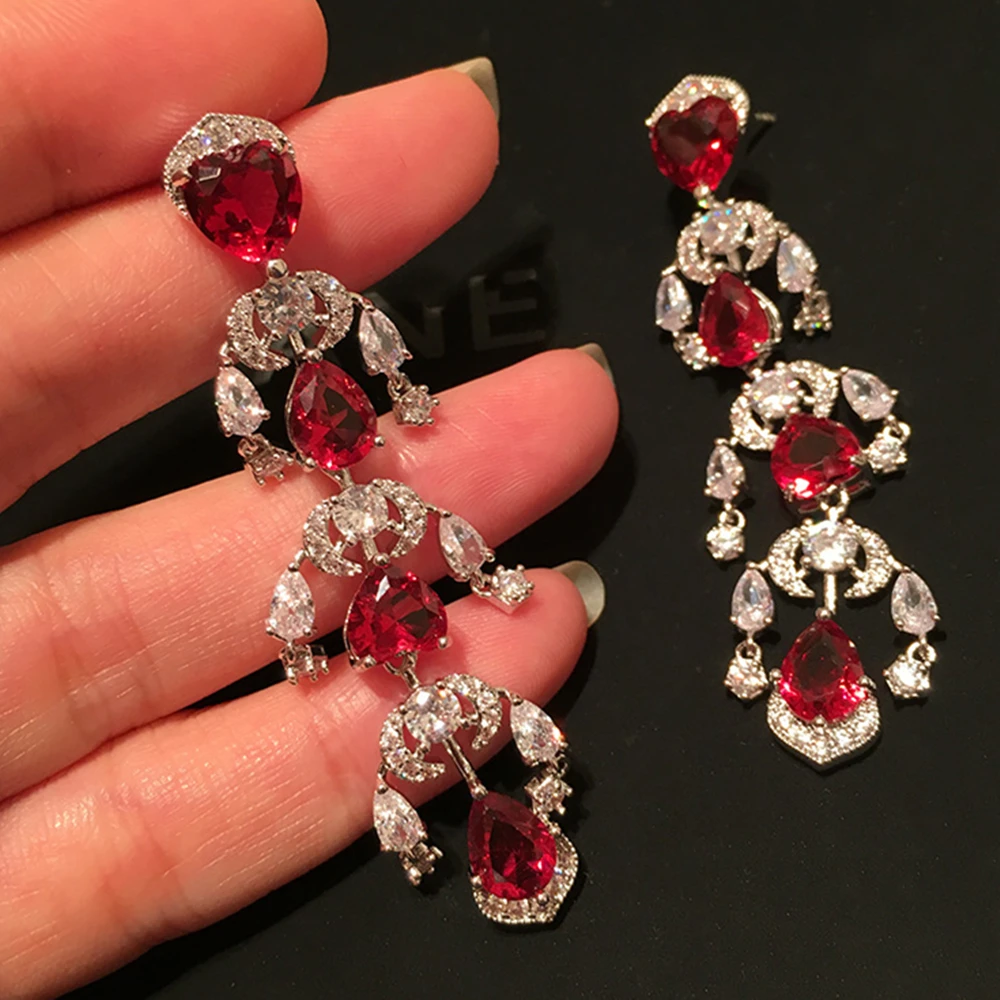 Массивные серьги с красными кристаллами висячие кисточками хорошее ювелирное