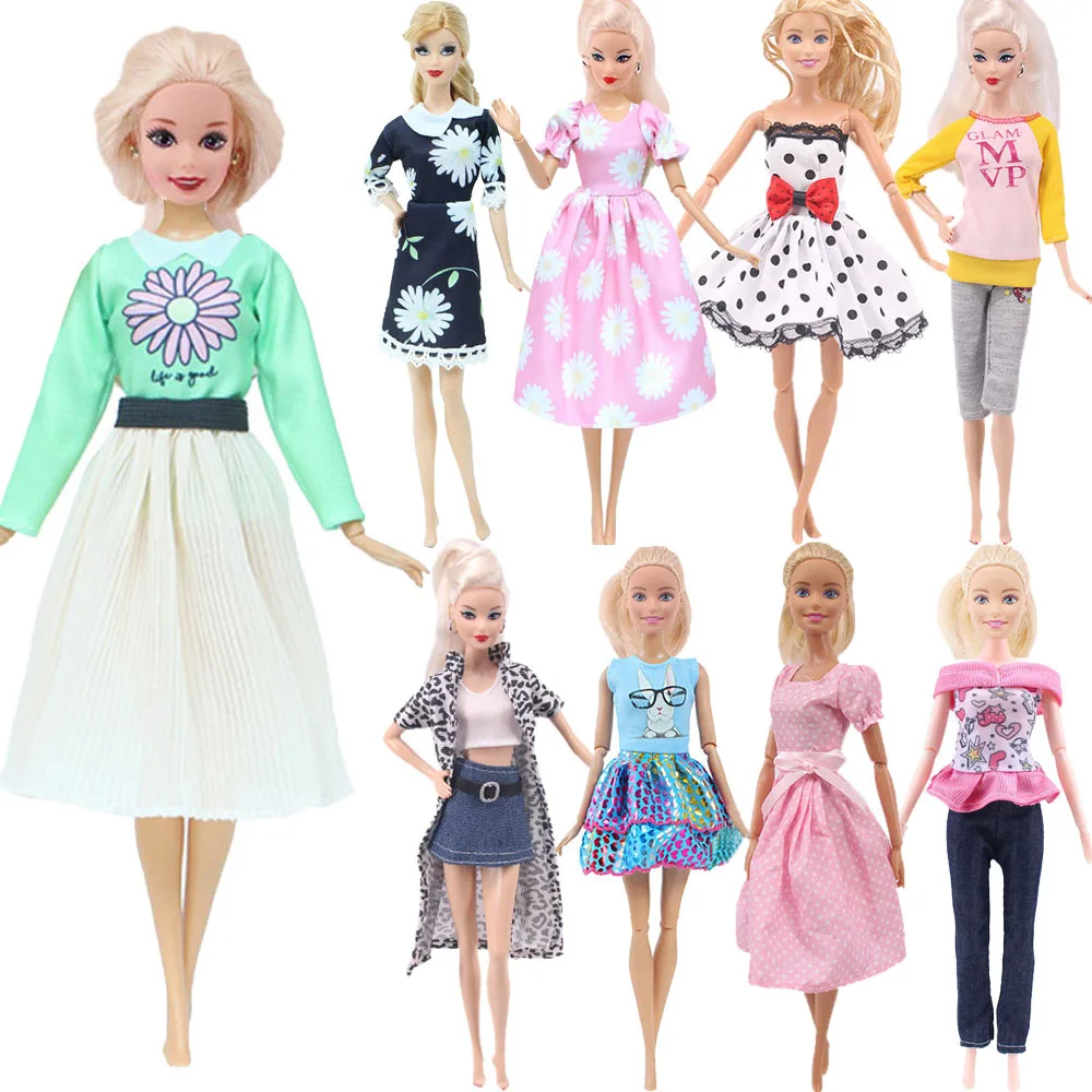 

Аксессуары для кукол Барби, 1 комплект, одежда, модный многоцветный наряд, розовое платье с маргариткой, рубашка, джинсовая юбка в клетку, пов...