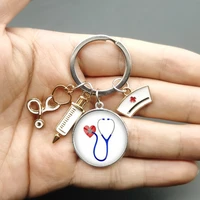 new fashion creative nurse medical syringe stethoscope image keychain glass cabochon and glass dome key ring pendant gift