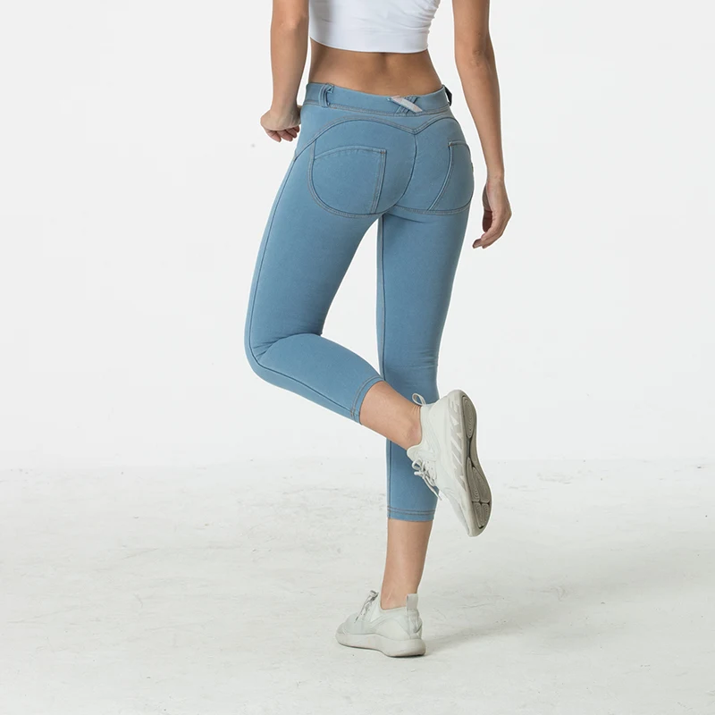 Женские узкие джинсы до середины икры эластичные на молнии с пуговицами и низкой