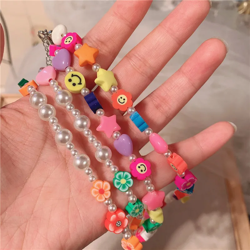 

HangZhi 2021 New Bohemian Colorful Soft Pottery Flower Star Resin Seeds Beads Handmade Necklace for Women Jewelry Beach Travel