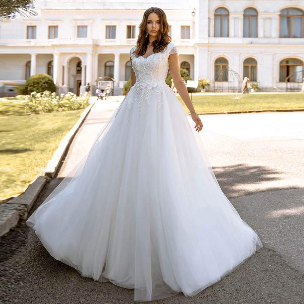 

Ball Gown Robe De Mariee Wedding Dresses Cap Sleeve V Neck Lace Appliques Tulle Backless Bridal Dress Mariage Gowns
