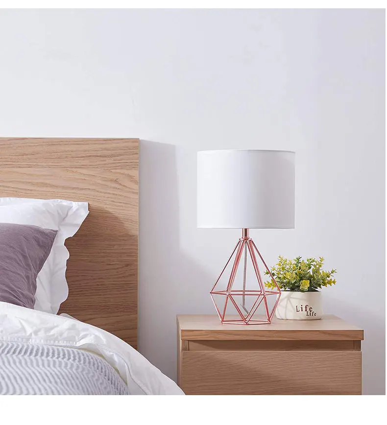 Modern minimalist metal paint rose gold hollow diamond design cloth table lamp personality diamond LED lighting bedroom decor