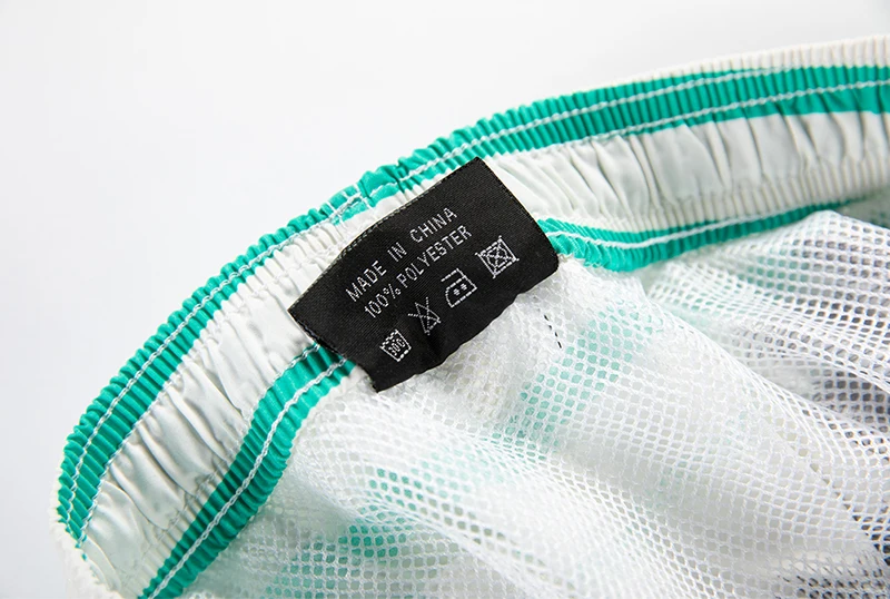 

Jiabing brand Summer 2021 new European and American high-end coconut tree striped loose large size beach casual shorts