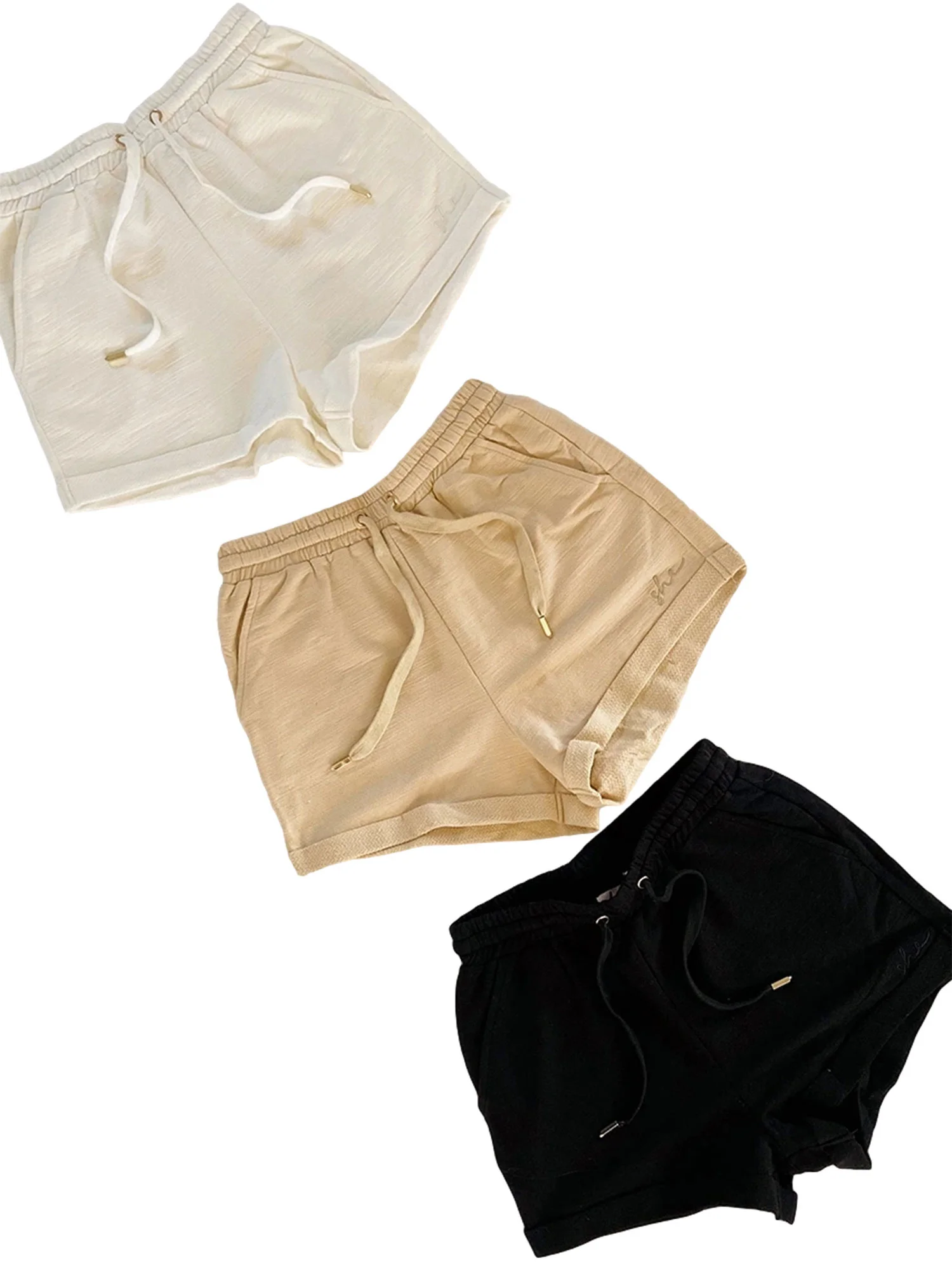 

New warm female casual shorts, elastic, solid-colored waistband rolled out sleeves down short pants with pockets
