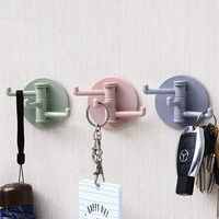 multifunctional bathroom wall shelf free punching seamless trace rack rotating hook strong 3 branch rotating sticky hook