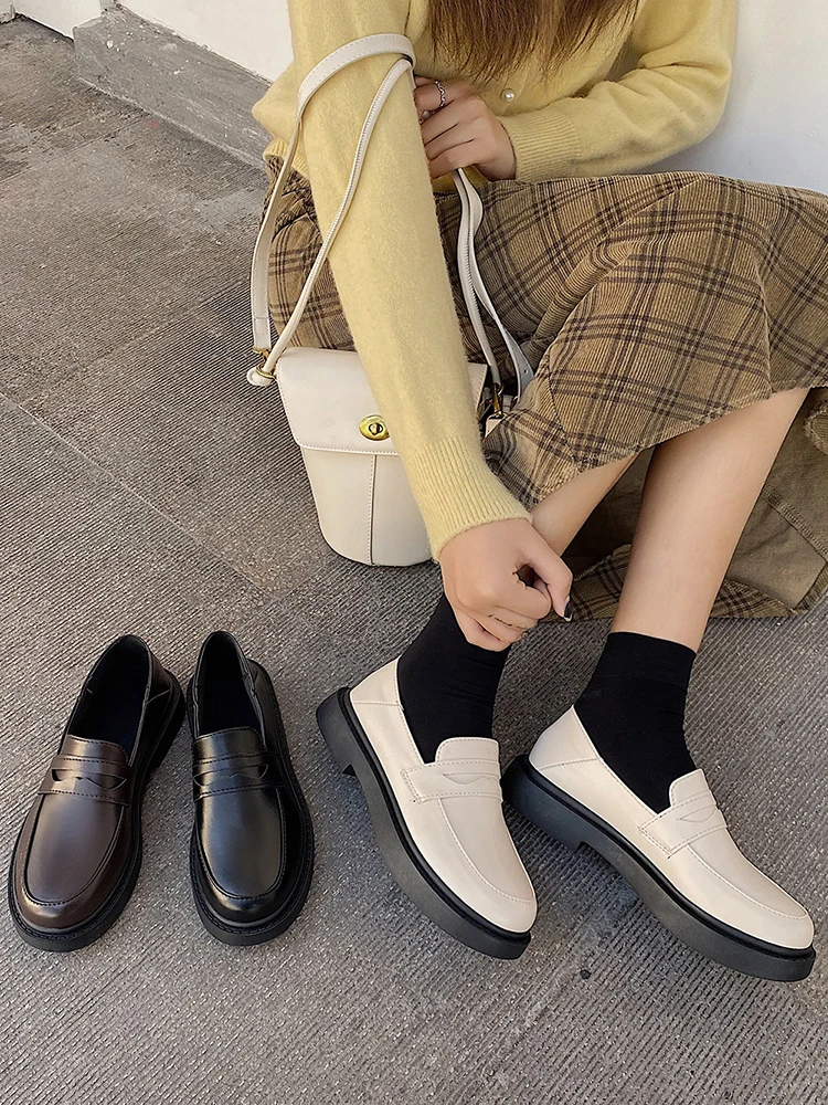

British style small leather shoes female cute Japanese retro 2021 spring new flat-bottomed Le Fu single shoes.