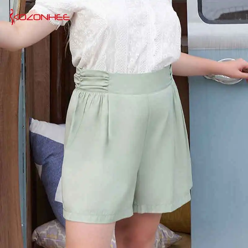

2021 summer solid color plus size wide leg shorts women's plus size high waist loose shorts straight casual shorts