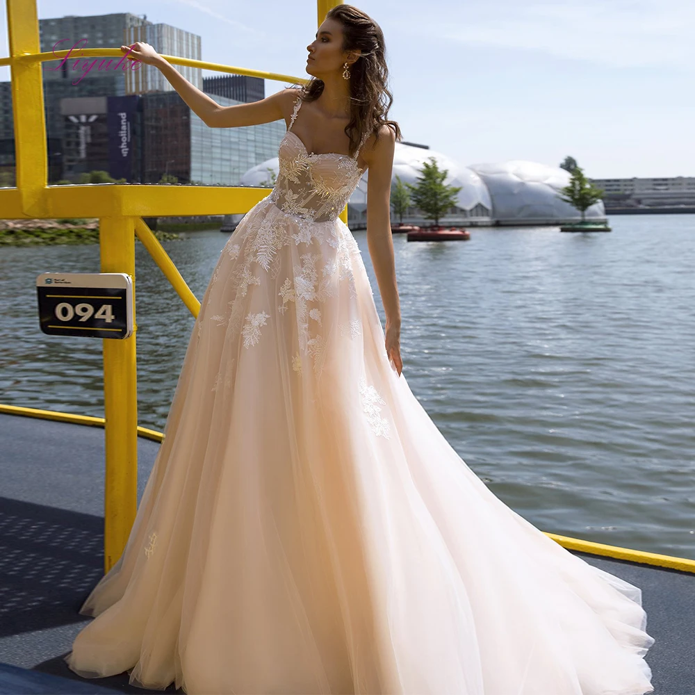 Фото Liyuke 2019 свадебное платье трапециевидной формы с сердечком и кружевной